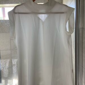 Sleeveless White Blouse
